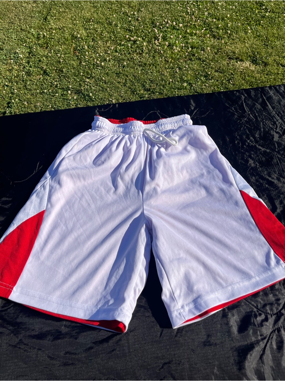 White Athletic Shorts with Red Side Panels and Drawstring